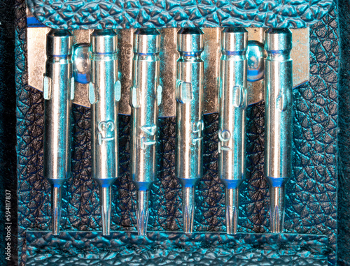 macro shot of a set of tork screwdrivers in a leather case photo
