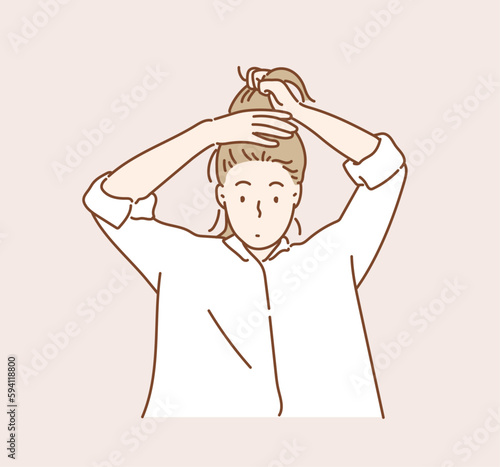Woman tied her hair in a ponytail. Hand drawn style vector design illustrations.