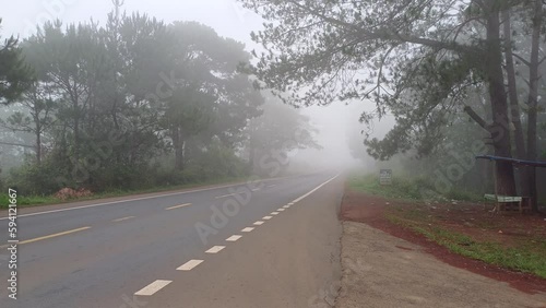 Morning on the street with fog, in highlands of Vietnam photo