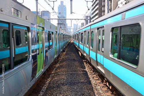 Two Trains running side by side near JR Okachimachi Station in Tokyo