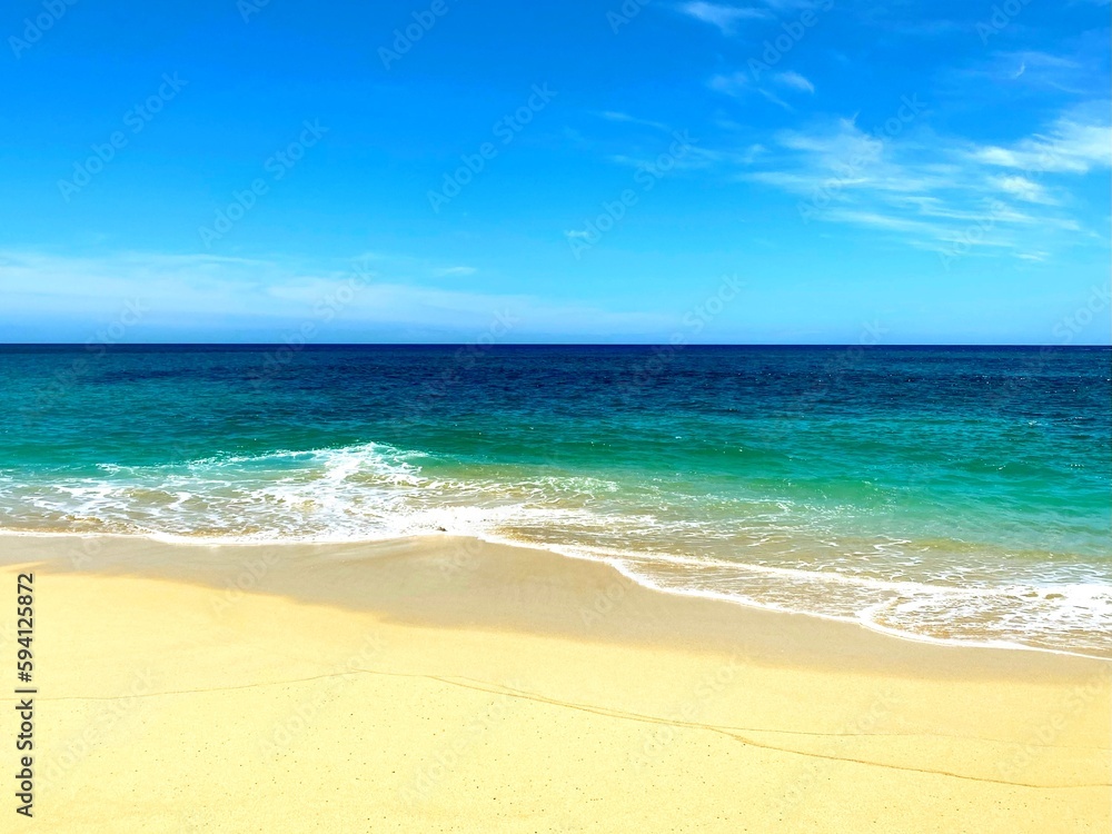 Fototapeta premium Pacific Ocean meets the sand on the westside of Oahu Hawaii