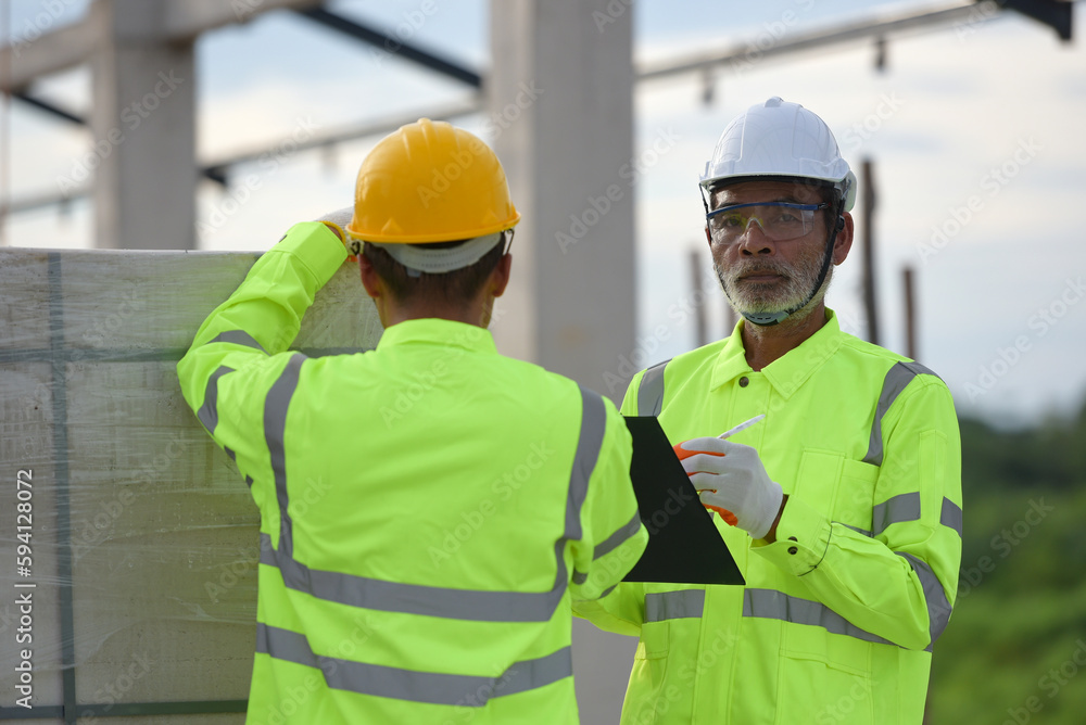 Construction supervision engineering team construction manager and architect working on building site Construction supervision engineering team construction manager and architect working on building site