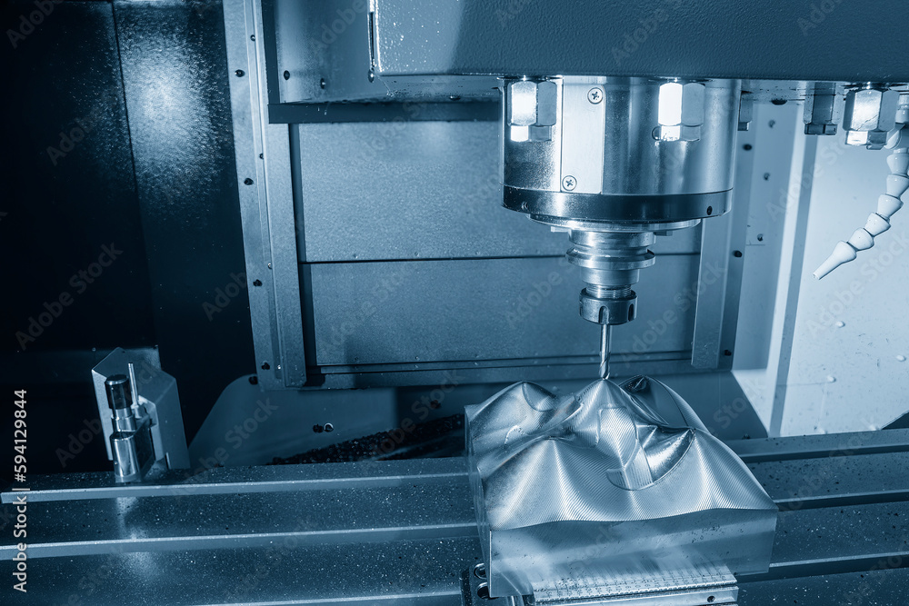 The CNC milling machine cutting injection mold part by solid ball end mill tool. The CNC milling machine cutting injection mold part by solid ball end mill tool.