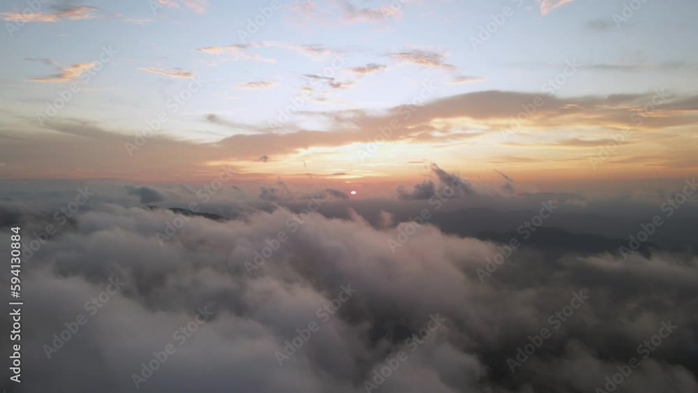 4K Drone Flight Over Orange Sunset Sky With Sun And Clouds