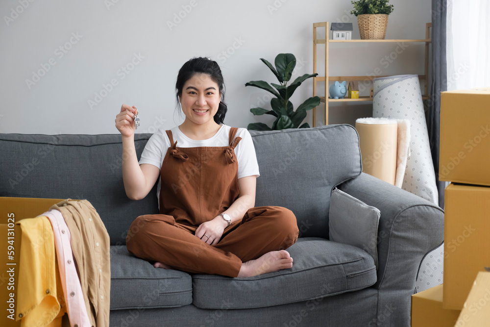 Woman owner buy purchase home, relocate to dwelling, rental, rent, ownership concept Woman owner buy purchase home, relocate to dwelling, rental, rent, ownership concept