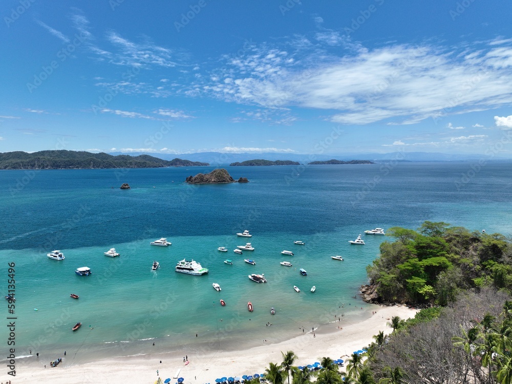 Isla Tortuga is a small uninhabited island off the coast of Costa Rica, known for its pristine beaches, crystal-clear waters, and abundant marine life for snorkeling and diving.