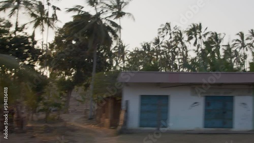 Wallpaper Mural Driving through rural African villages at sunset. Woodland and huts Torontodigital.ca