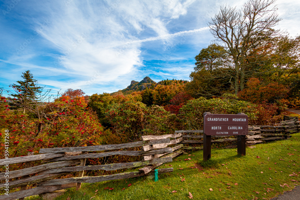 Grandfather Mountain State park in fall season. Grandfather Mountain is a mountain near Linville, North Carolina. At 5,946 feet, it is the highest peak on the eastern of the Blue Ridge Mountains.