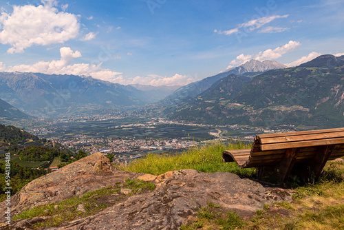 Panoramic view to city Merano and mountain range texelgroup seen from little Church St. Hippolyt photo