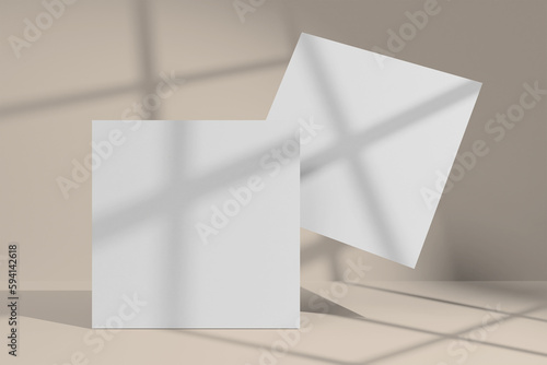 Mockup of two square greeting cards with window shadow overlay