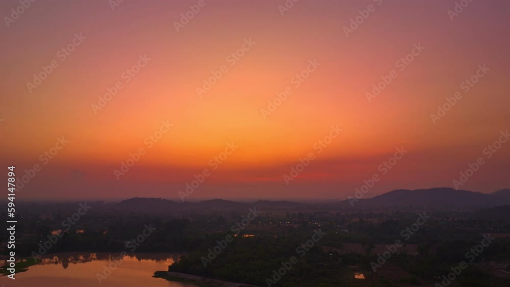 Aerial Hyperlapse or Dronelapse view fly over the large puddle..Cinematic hyperlapse sand lakes in large field in beautiful twilight..Day to night sunset hyperlapse over the large pond.. Aerial Hyperlapse or Dronelapse view fly over the large puddle..Cinematic hyperlapse sand lakes in large field in beautiful twilight..Day to night sunset hyperlapse over the large pond..