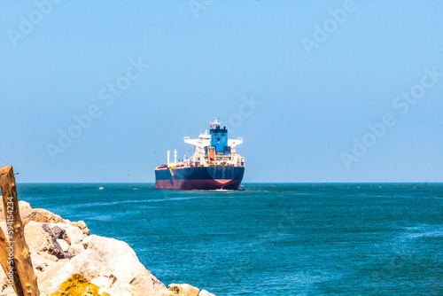Obraz na plátně ship of chemicals in sea with blue sky, green water in gulf of mexico, miramar b