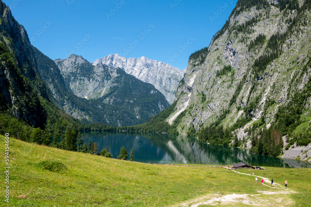 Scenic view towards Fischunkelalm and Lake Obersee in Germany's Berchtesgaden National Park with the Watzmann group in the background