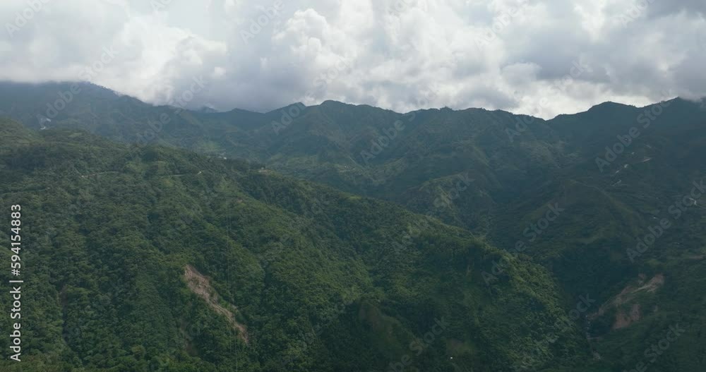 Aerial view of mountains and hills with green vegetation and trees in the tropics. Negros, Philippines Aerial view of mountains and hills with green vegetation and trees in the tropics. Negros, Philippines