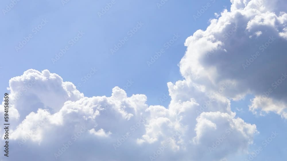 Video blue sky white clouds. Fluffy white clouds. Cumulus cloud timelapse. 4K Video sky clouds Video blue sky white clouds. Fluffy white clouds. Cumulus cloud timelapse. 4K Video sky clouds