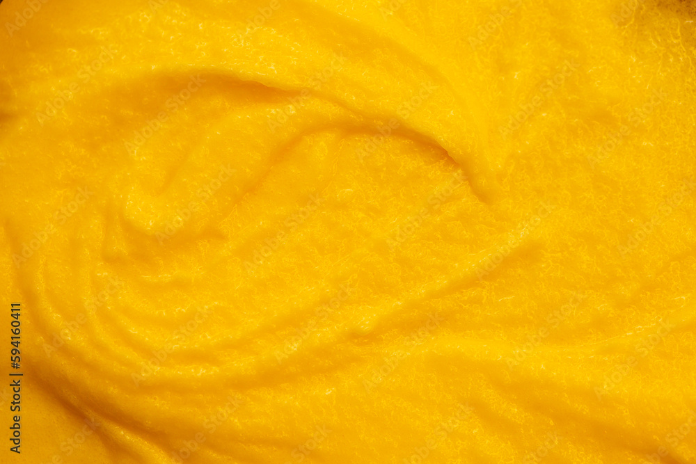 Fruit yogurt ice cream. Smoothies from fresh fruits and berries. Ice cream texture. Delicious sweet dessert close-up as a background. Fruit yogurt ice cream. Smoothies from fresh fruits and berries. Ice cream texture. Delicious sweet dessert close-up as a background.