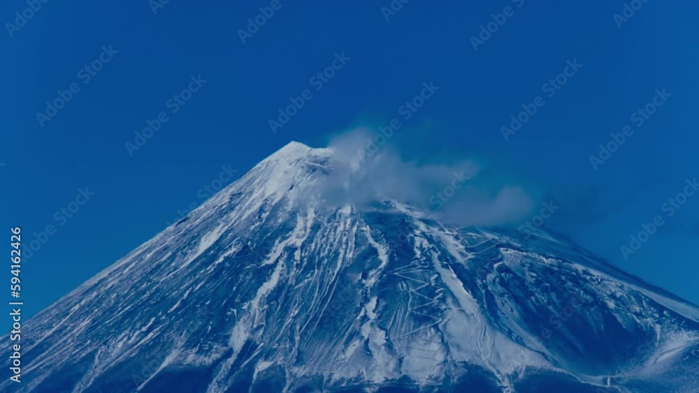 A timelapse of Mt.Fuji near Suruga coast in Shizuoka telephoto shot zoom A timelapse of Mt.Fuji near Suruga coast in Shizuoka telephoto shot zoom