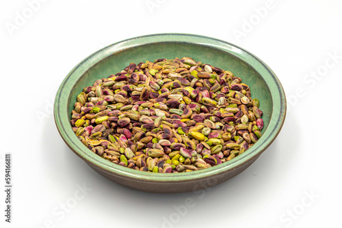 pistachios in the pot on a white background