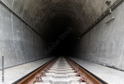 Train tunnel running through mountain