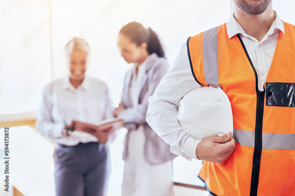 Architect, safety helmet and meeting for construction planning, collaboration or management at the office. Businessman, contractor or engineer holding hard hat in leadership for architecture project Architect, safety helmet and meeting for construction planning, collaboration or management at the office. Businessman, contractor or engineer holding hard hat in leadership for architecture project