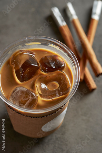 Ice coffee and cinnamon sticks