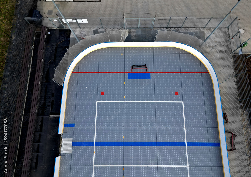 field hockey or ice hockey field. plastic grids of the dportovist