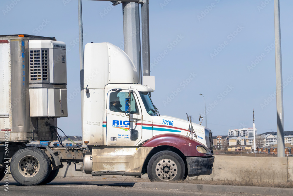 Calgary, Alberta, Canada. Apr 18, 2023. A trailer cargo Rig Logistics