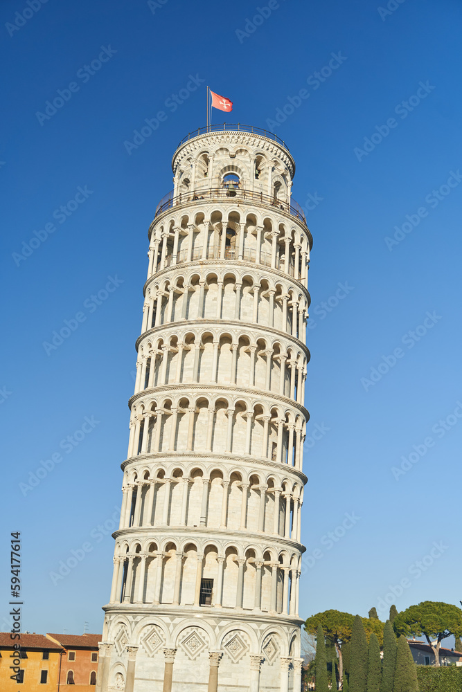 Pisa, Italy - 13.02.2023: View of the Leaning Tower of Pisa on a sunny day in the city of Pisa, Italy.