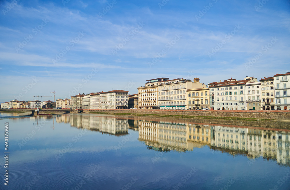 View of the river Arno and buildings from the embankment in Florence. High quality photo