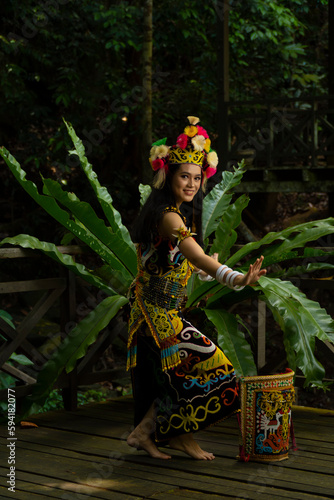 A Borneo lady showcasing the beauty of her culture through her stunning traditional clothing photo