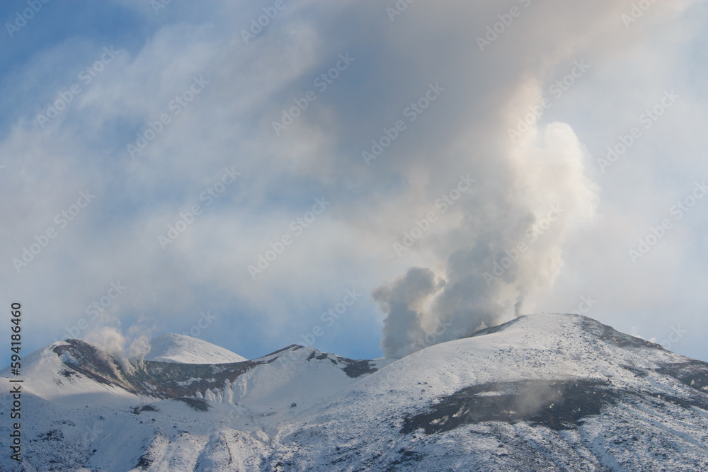 Clouds rising from Mt. Tokachi volcano, Hokkaido, Japan
