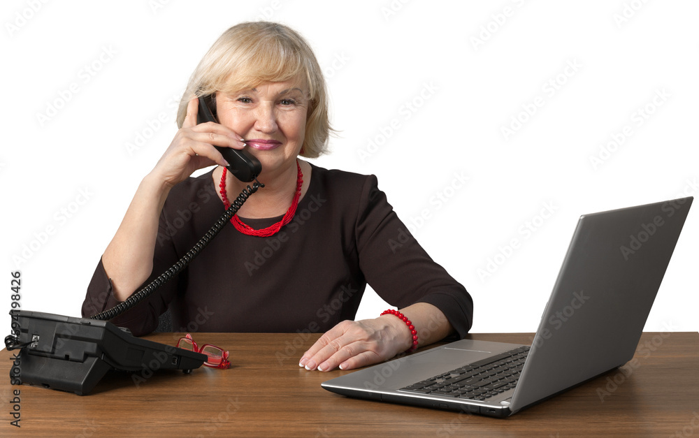 Old Woman Sitting behind Table and Talking on Corded Phone - Isolated Old Woman Sitting behind Table and Talking on Corded Phone - Isolated