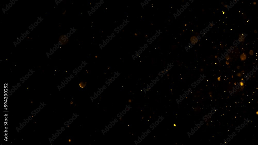 Black background with gold dust, beautiful bokeh. Black background with gold dust, beautiful bokeh.