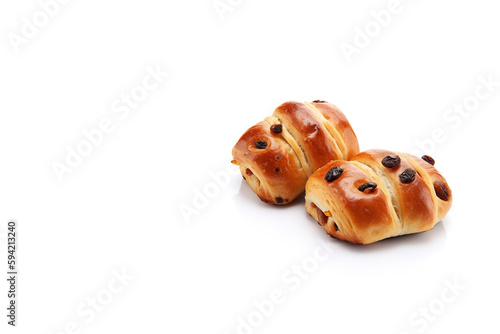 a group of buns with raisin toppings isolated on solid white background with copy space. Created with Generative AI Technology
