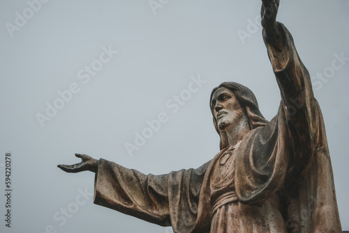 Statue of Jesus Christ blessing the people with its arms open. 