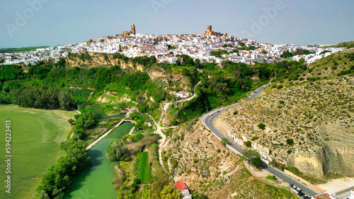 Arcos de la Frontera, Andalusia. Aerial view of whitewashed houses sporting rust-tiled roofs photo