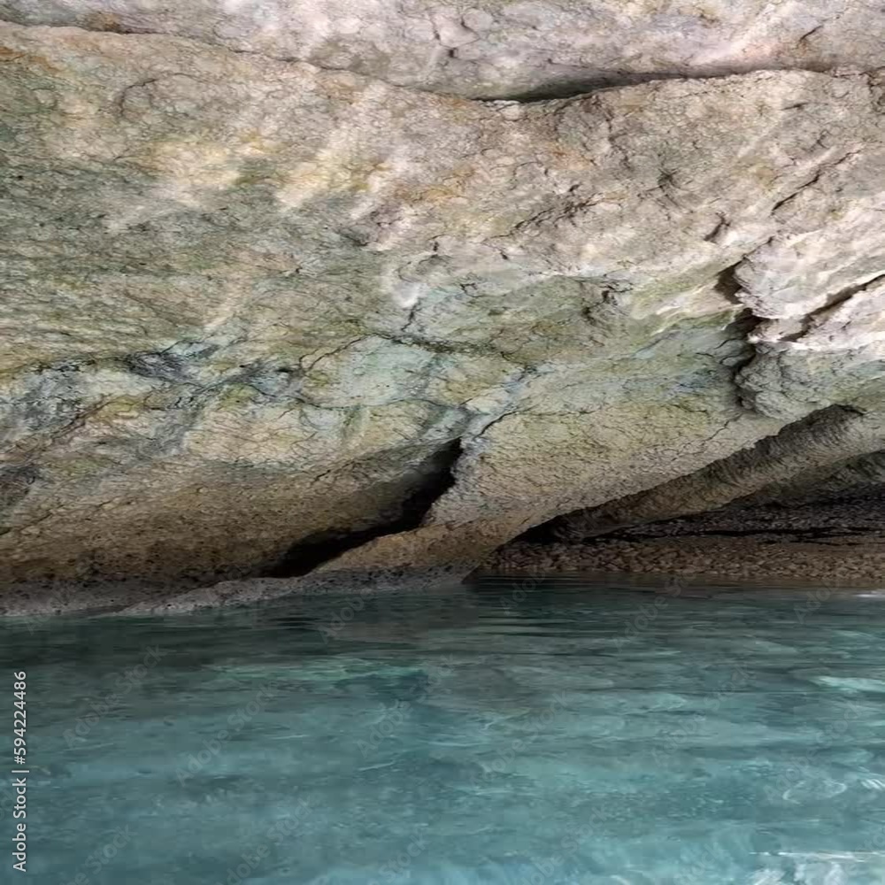 Shiny lights on rocks in the sea with clear blue water. Shiny lights on rocks in the sea with clear blue water.