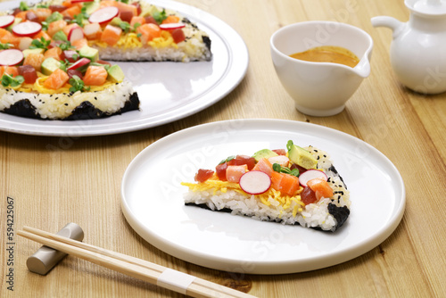 homemade Sushi pizza, creative sushi originating in Toronto, Canada