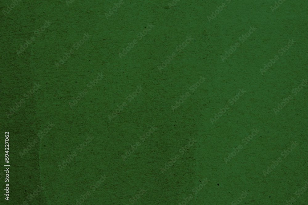 Green paper texture background. Abstract dark green surface for designs. Green paper texture background. Abstract dark green surface for designs.
