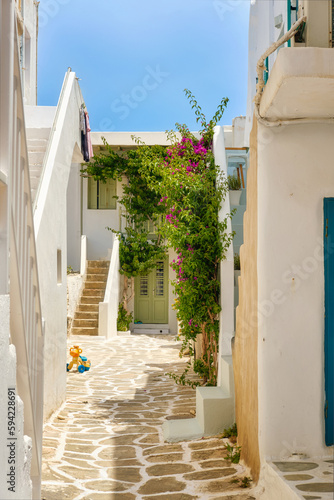 Whitewashed houses and streets of Greek island towns in summer