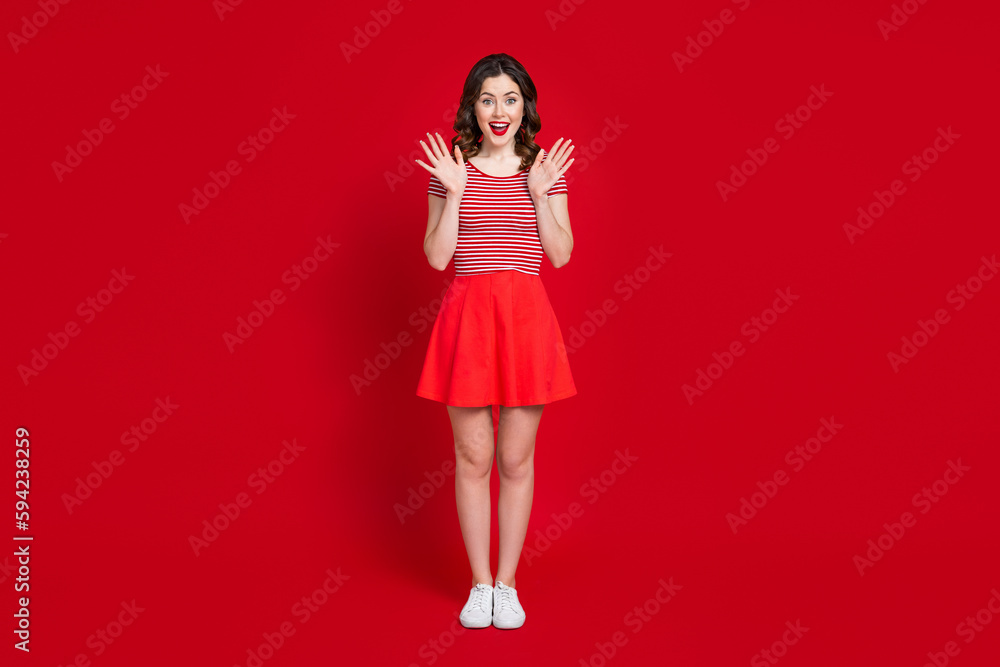 Full length photo of excited crazy lady see banner promotion enjoy low prices wear skirt top gumshoes isolated red color background Full length photo of excited crazy lady see banner promotion enjoy low prices wear skirt top gumshoes isolated red color background