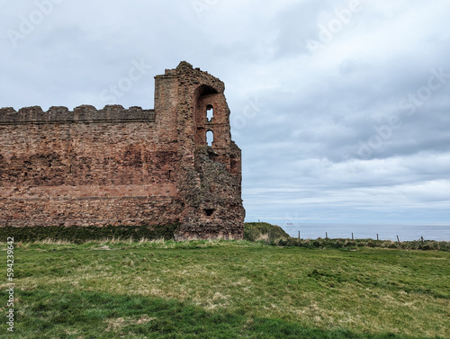 Принти на полотні The outside wall to the imposing Tantallon Castle on the southern shore of the Firth of Forth, East Lothian, Scotland, UK