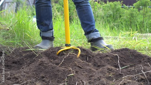 Preparation of land for planting vegetables crops with a manual cultivator tool