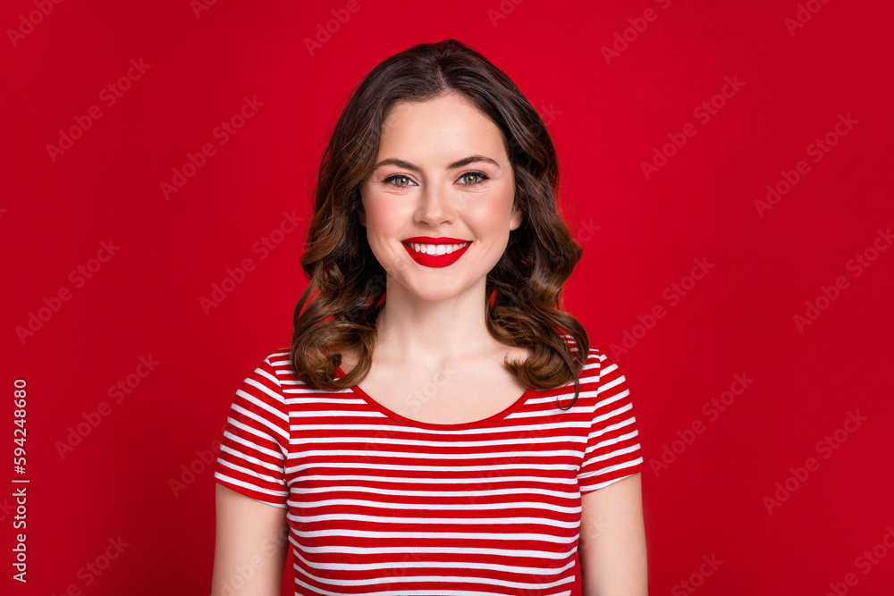 Photo of stunning cheerful woman bright holiday make up celebrate festive event isolated on red color background Photo of stunning cheerful woman bright holiday make up celebrate festive event isolated on red color background