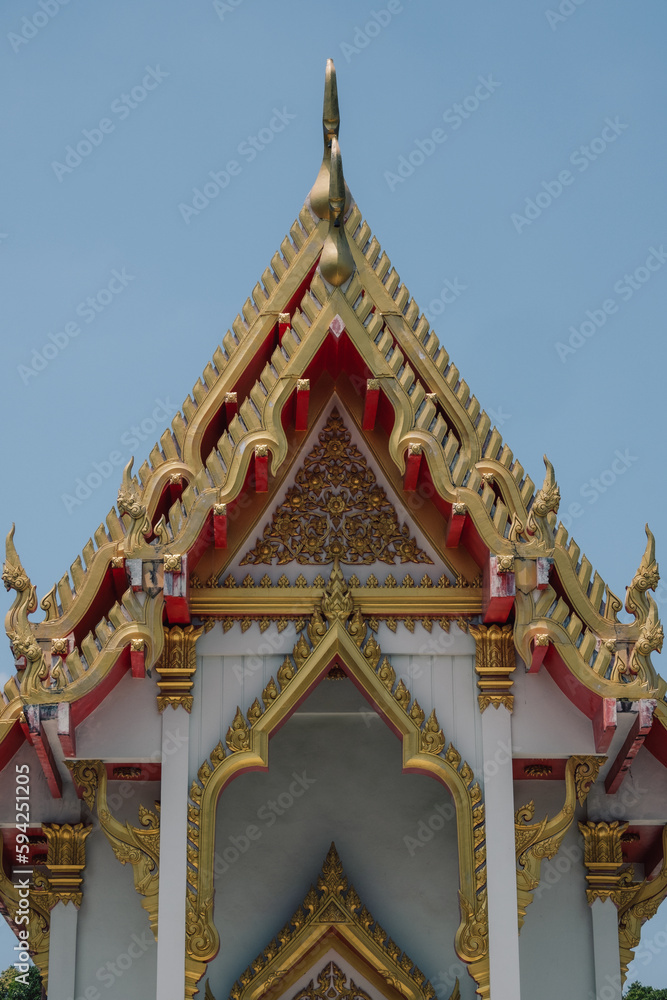 Naklejka premium Buddhism Religion Golden Temple Image Sough-East Asian Praying Statue