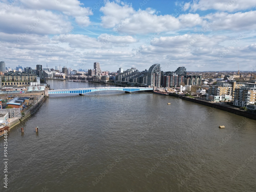 Battersea Railway Bridge, River Thames London UK drone aerial view .