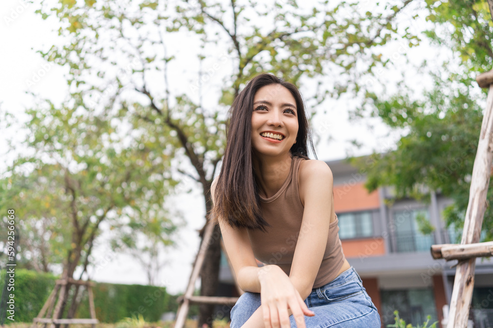 Happy feeling of Beautiful Young Woman smiling outdoor in sunlight. Pretty attractive face of female and beautiful smile. She is positive thinking and successful. Happy feeling of Beautiful Young Woman smiling outdoor in sunlight. Pretty attractive face of female and beautiful smile. She is positive thinking and successful.