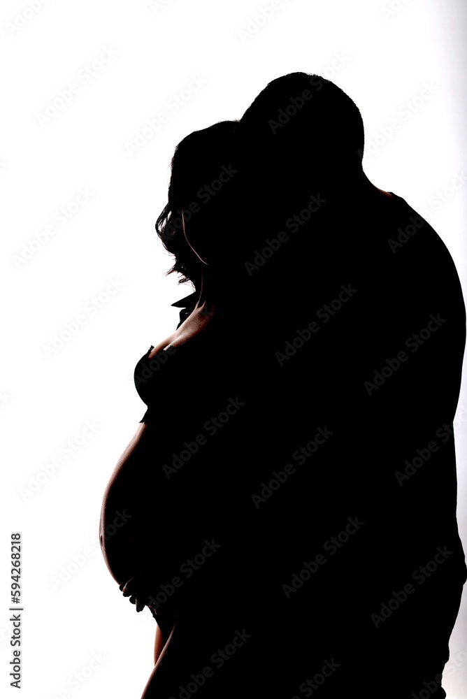 Pregnant girl with man on white background shadow isolated for advertising and text