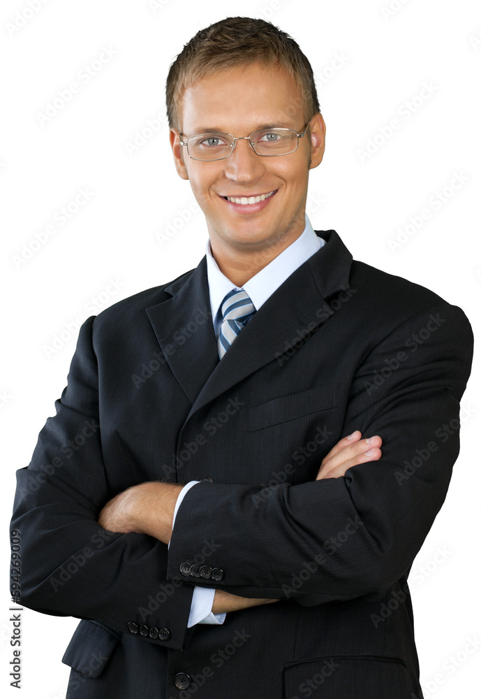 Professional looking man with his arms crossed wearing a suit Professional looking man with his arms crossed wearing a suit