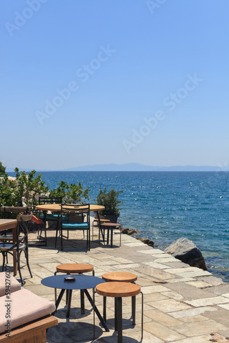 street pretty outdoor cafe with the beautiful view on the sea © kavrishka90